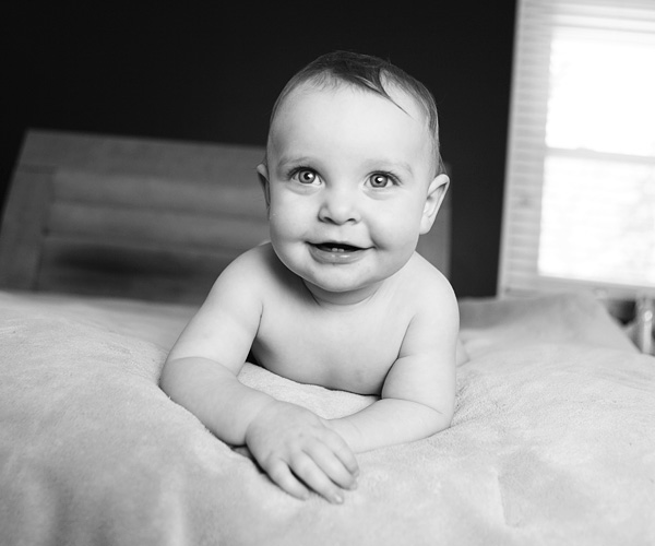 Baby crawling on the bed