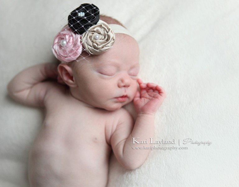 Small newborn girl baby portrait
