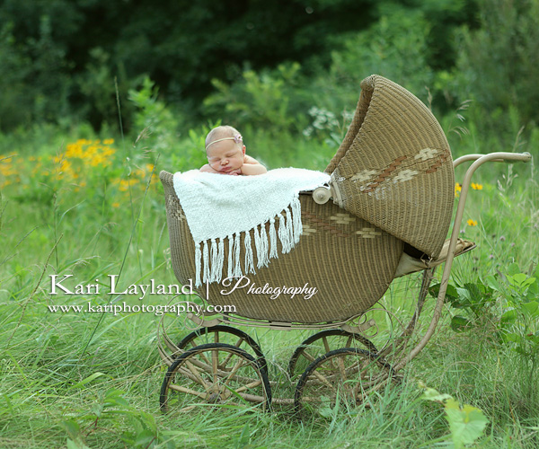 Newborn photography in baby carriage