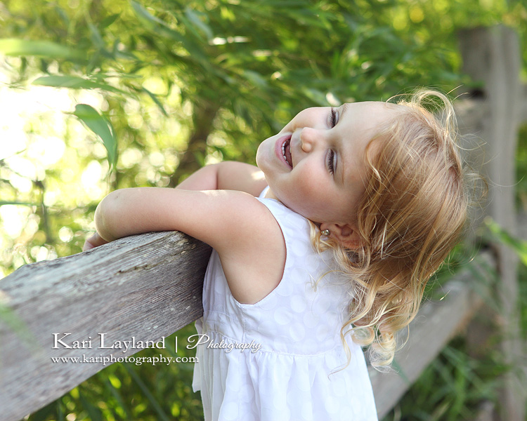 Laughing toddler portrait MN