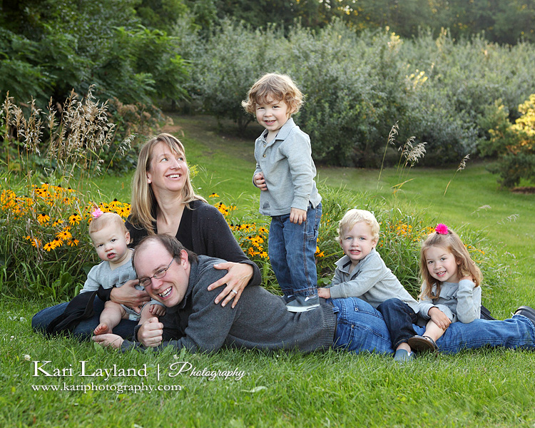 Candid family portrait photograph.  Taken in MN by photographer Kari Layland.