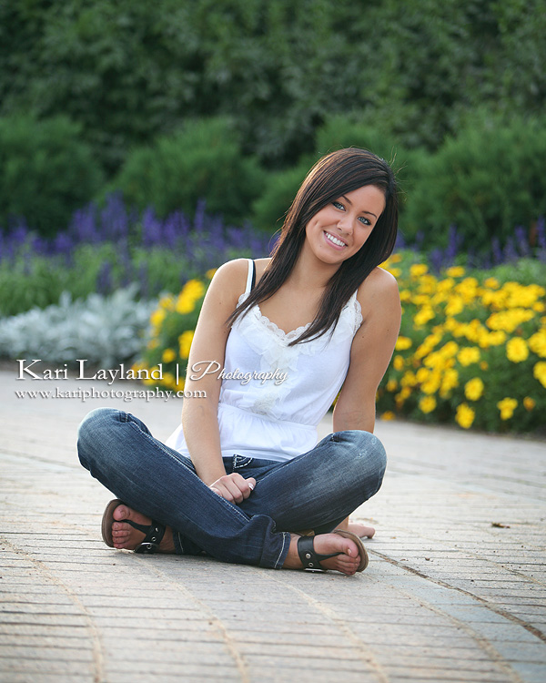 Outdoor senior portraits with flowers in Minnesota.