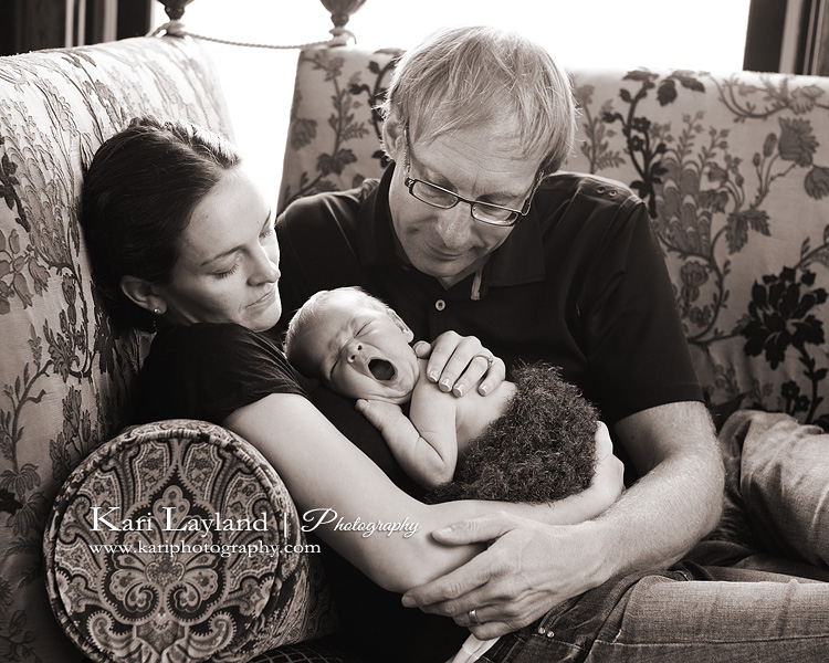 newbon baby family portrait.  Taken in St Paul Mn by Kari Layland, photographer.