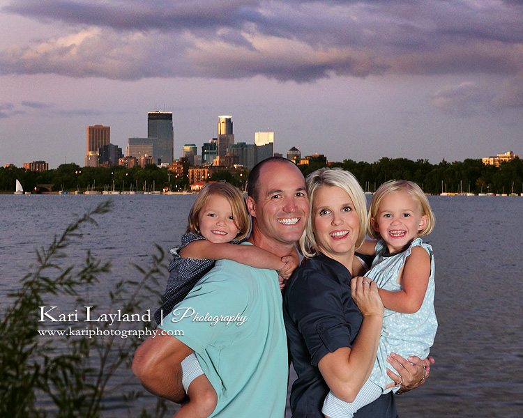 Family portrait in front of the Minneapolis skyline.
