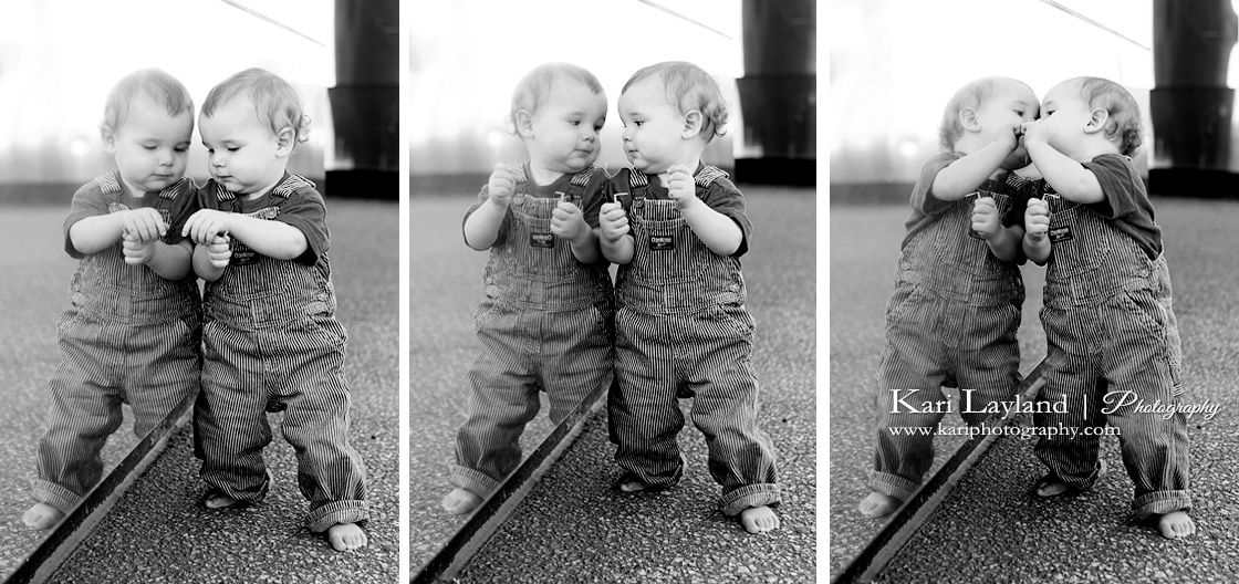 Baby kissing the mirror.  Taken in Minneapolis, MN by photographer Kari Layland.